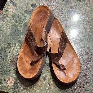 A pair of Lani Olukai flip flops.  Size 9,